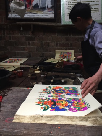 Printer at Tantau: hand-printing Door Guardian prints (about 100 per hour)